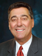 Dr. ALBERT K. KARNIG